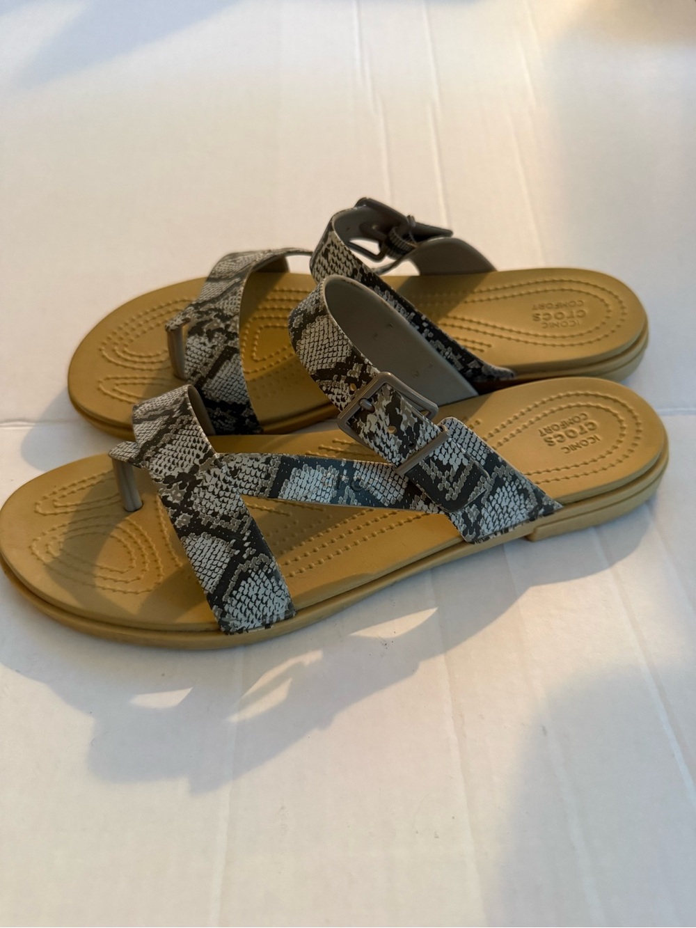 CROCS Snake-Print Toe-Post Sandals in Black and Tan